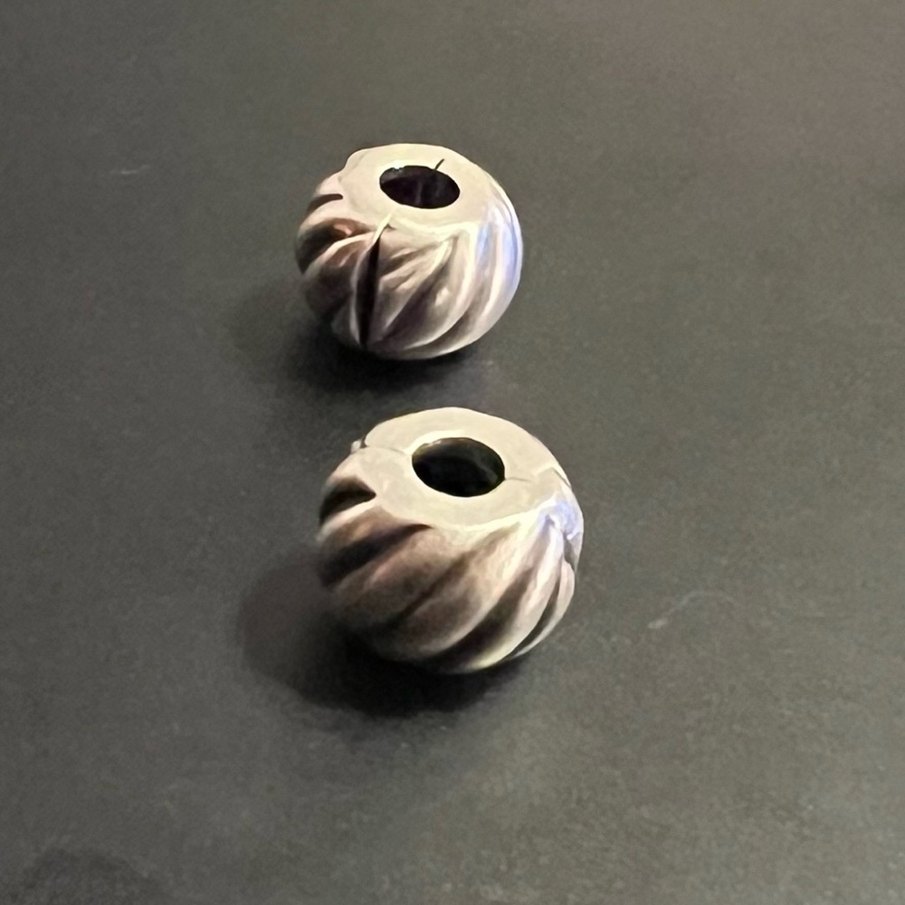 Pandora clips for charm bracelet
